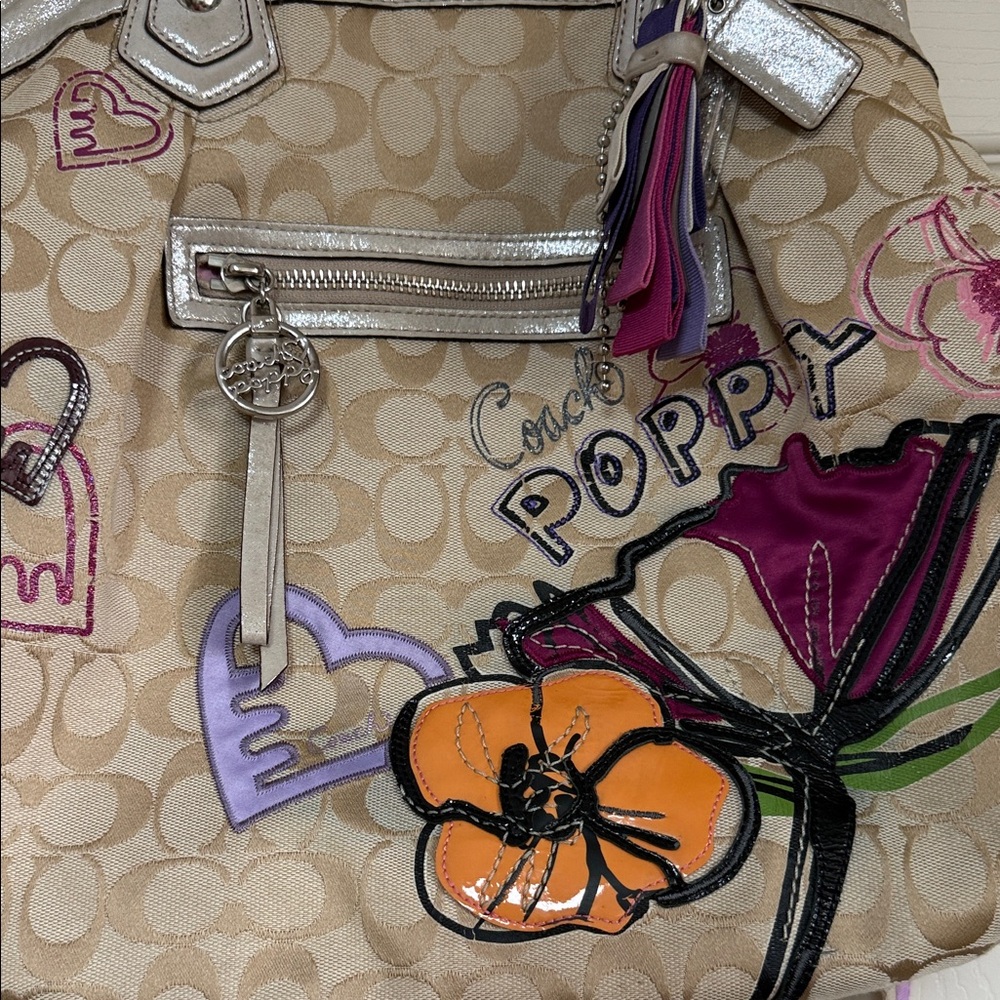 Coach Beige Signature Canvas Shoulder Bag with Purple & Orange Floral Appliqués - Picture 2 of 16